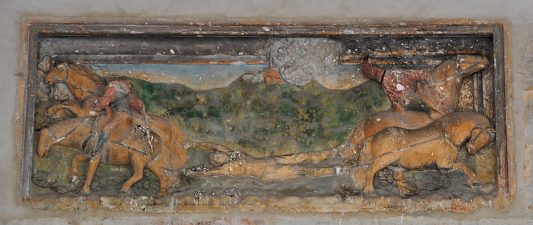 Bas–relief au–dessus du portail principal : «Le Martyre de saint Hippolyte»