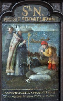 Panneau peint du XVIe siècle : Saint Nicolas nourrit pendant la famine