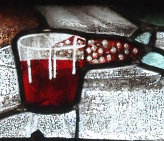 Détail de la baie 5 : le verre de vin (1534)