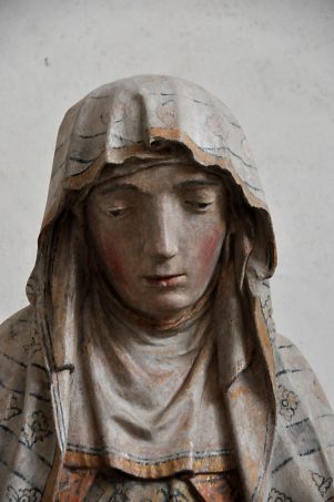 Le visage d'Anne dans la statue de l'Éducation de la Vierge, XVIe  siècle