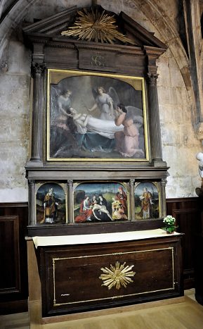 Le retable en bois et ses tableaux