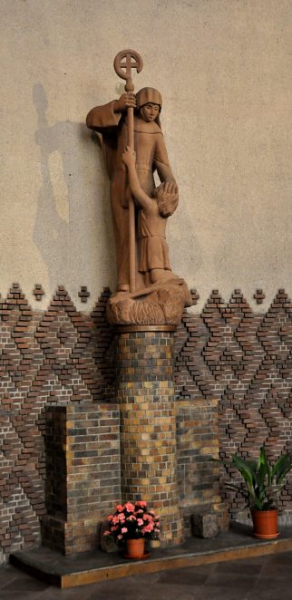 Statue de sainte Odile guérissant une fillette aveugle