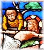 Jésus est cloué sur la croix, vitrail du Chemin de croix, XIXe siècle